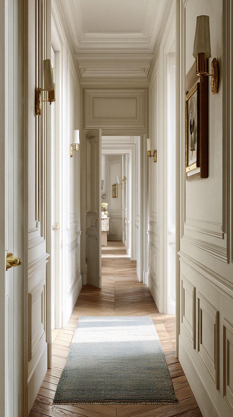 a-narrow-french-style-hallway-with-classic-molding-and-boise