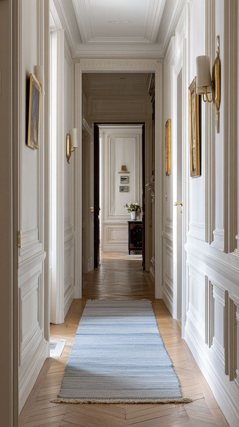 a-narrow-french-style-hallway-with-classic-molding-and-boise