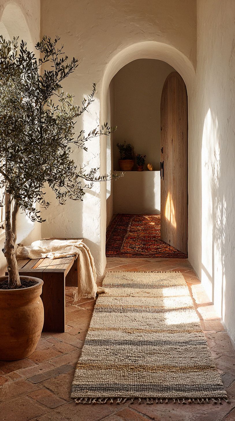 a-sunlit-mediterranean-hallway-with-white-plaster-walls-and-